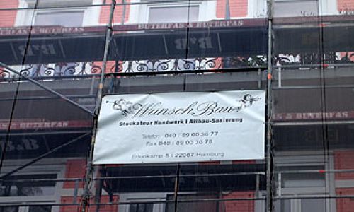 Sanierung einer Fassade und eines Balkons
