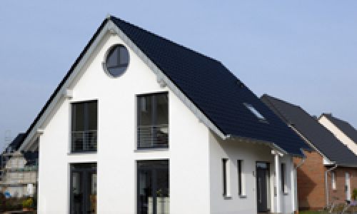 Traditionelle Putzarbeiten an einer Außenfassade